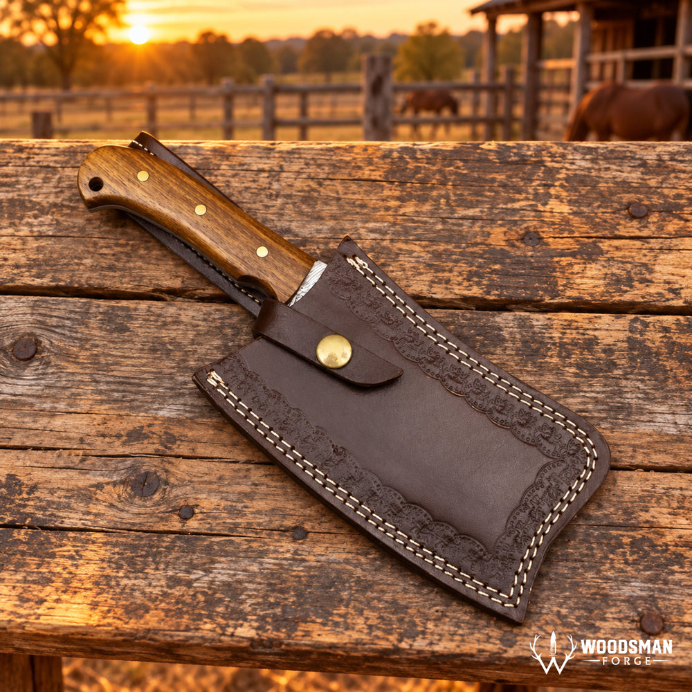 A dark brown leather knife sheath with decorative stitching and a snap closure, holding a knife with a wooden handle, resting on a rustic wooden fence at sunset. A horse is visible in the blurred background.