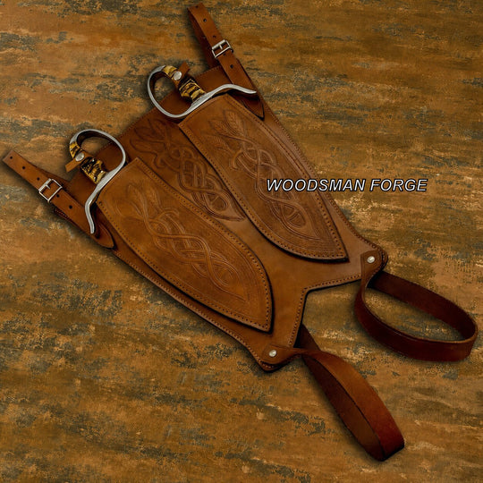 A brown leather chaps leg warmer with tooled Celtic knot patterns and silver-toned metal buckles, displayed on a rustic textured brown background with a &
