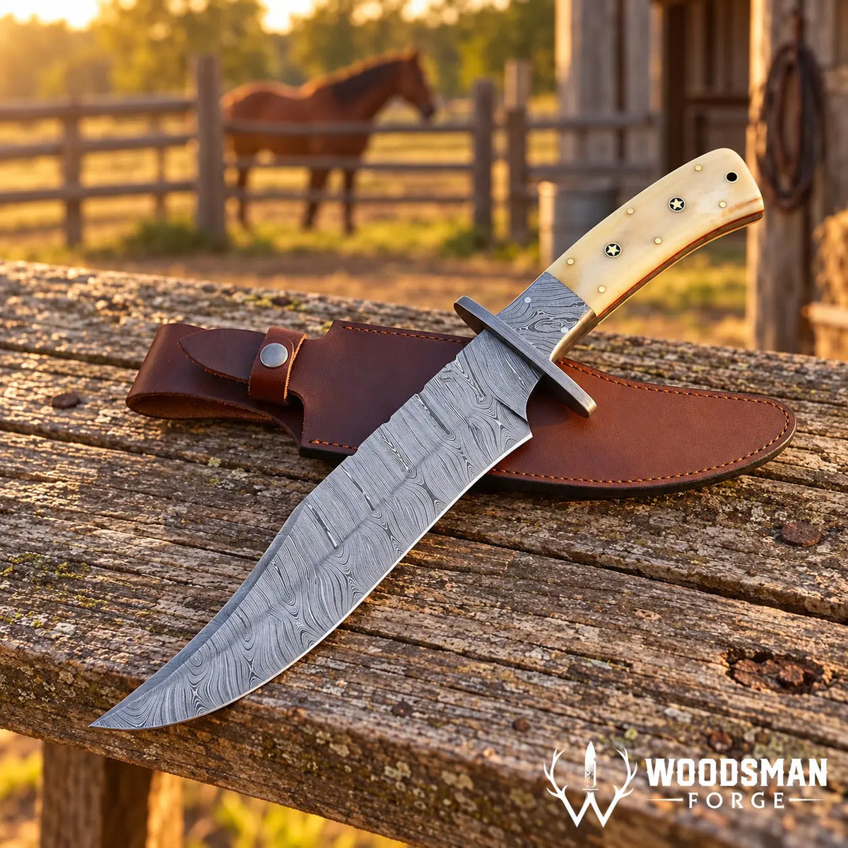 A large fixed-blade hunting knife with a patterned steel blade and a light wood handle lies on a weathered wooden surface next to a brown leather sheath. A blurred horse and fence are visible in the background, and a Woodsman Forge logo appears in the lower right corner.